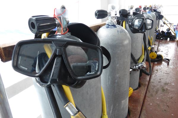 Our scuba equipment on a tank on the boat