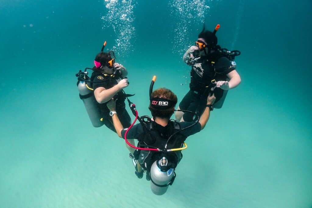 two students Try Scuba diving