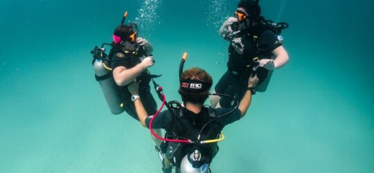 two students Try Scuba diving