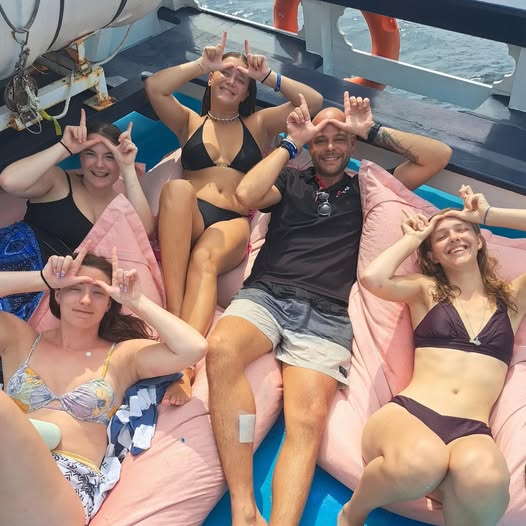 Big Blue Diving graduates having just dived with a whaleshark on their Open Water Course